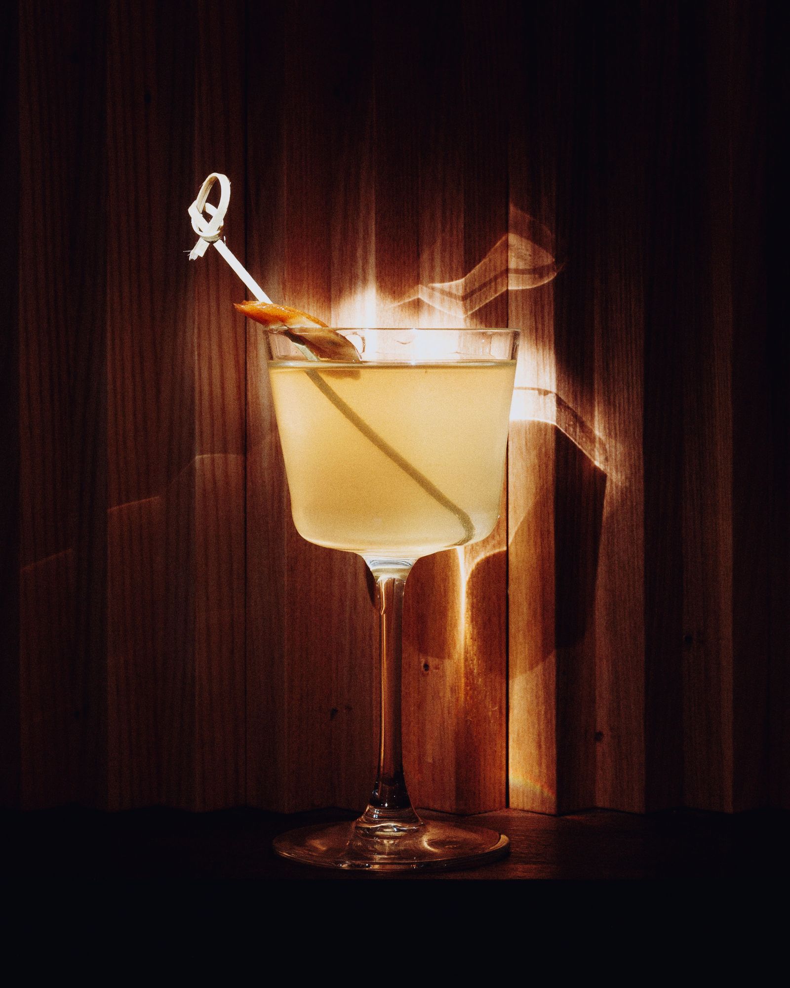Image may contain Alcohol Beverage Cocktail Glass and Lamp